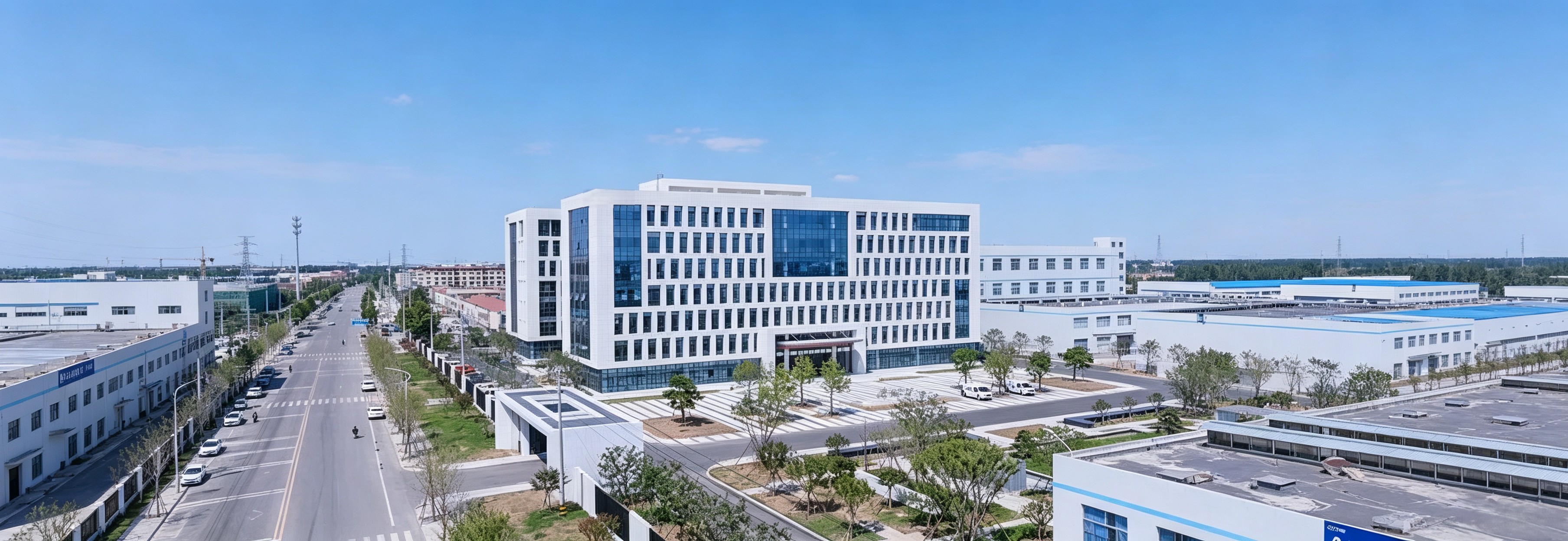 Aerial view of large modern work glove manufacturing industrial park, full vertical factory base for OEM & ODM industrial gloves
